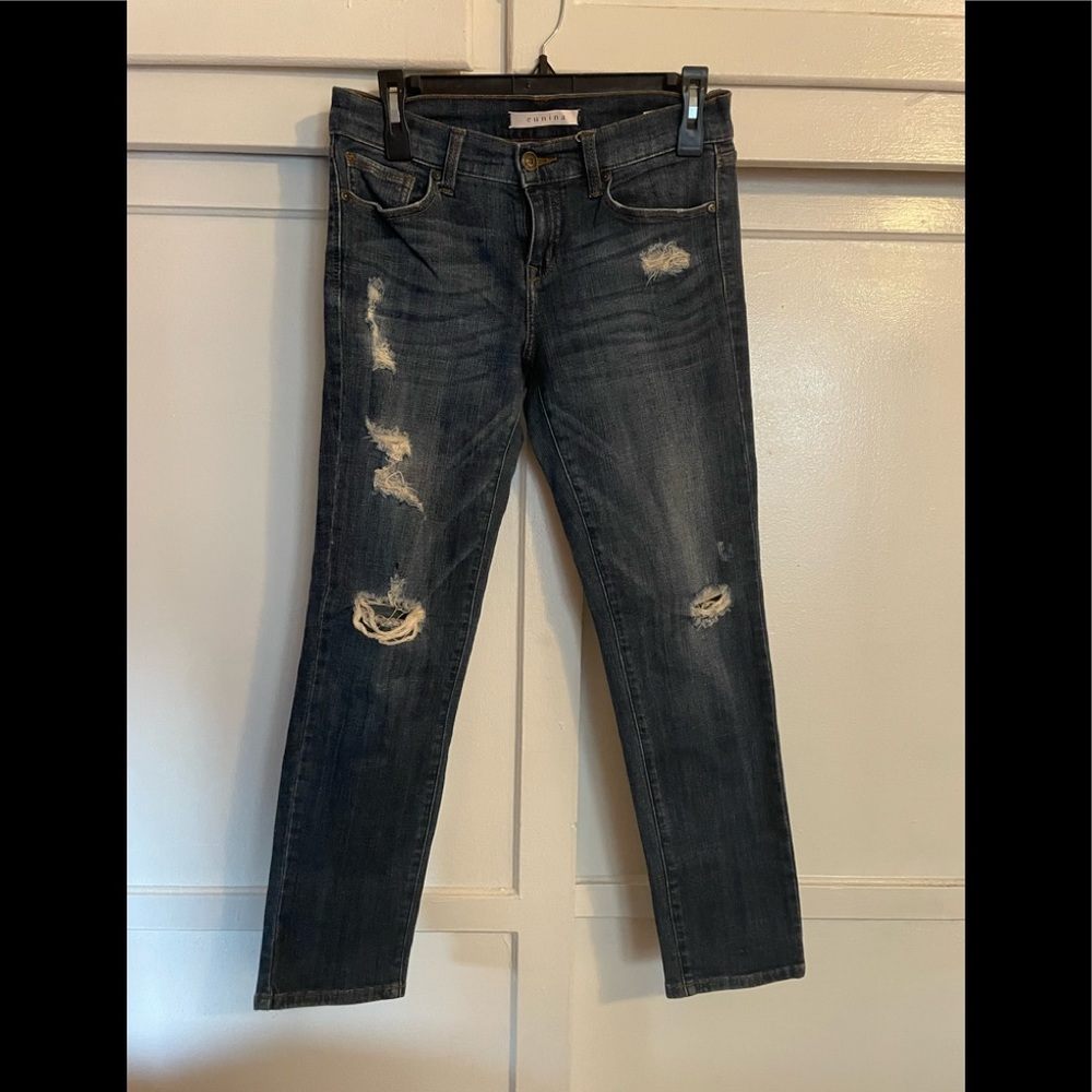 Woman’s ripped pants